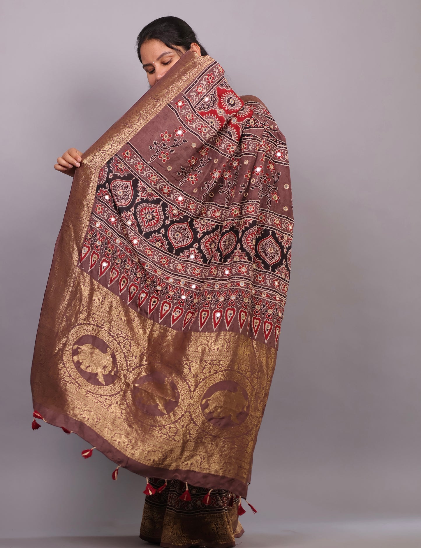 Handcrafted Ajrakh Dola Silk Saree with Authentic Banjara Mirror Work | Looms & Tassel