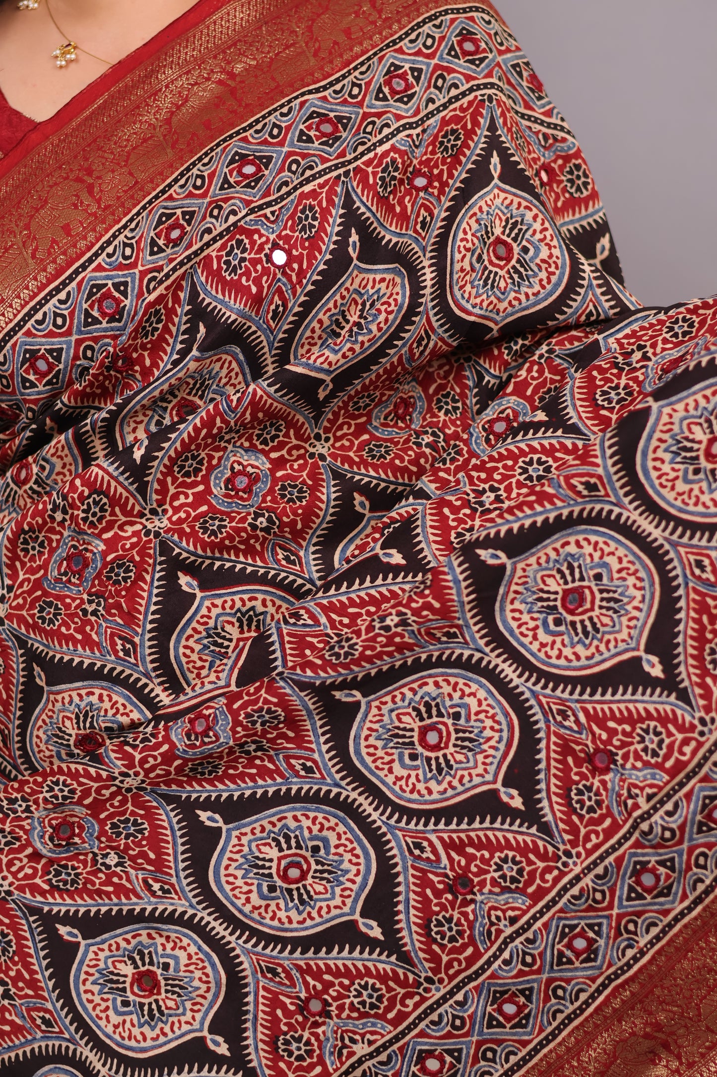 Red & Black Handcrafted Ajrakh Dola Silk Saree with Authentic Banjara Mirror Work | Looms & Tassel