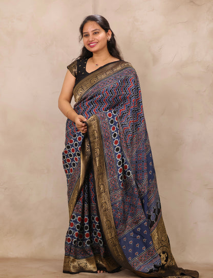 Indigo Ajrakh Handblock printed Dola Silk Saree | Looms & Tassels